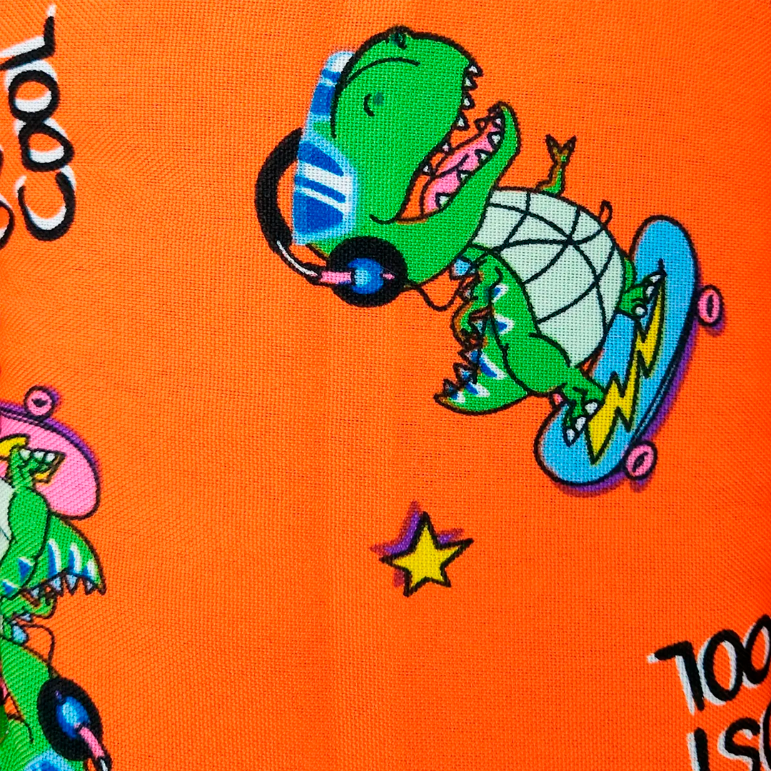 Tapete Estampado Y Acolchado Transportadora Para Mascota Dinosaurios Naranja