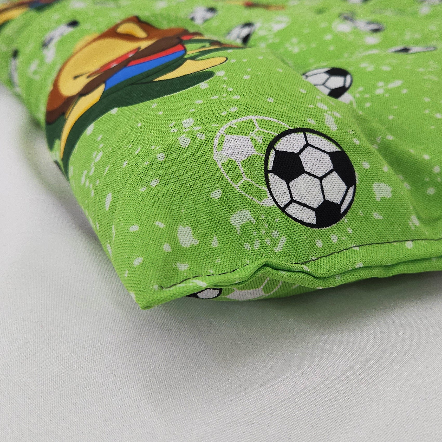 Tapete Estampado Y Acolchado Transportadora Para Mascota Leon Futbolista